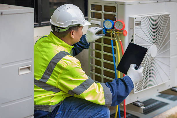 Professional Heat Pump Repair technician working in Three Bridges, NJ